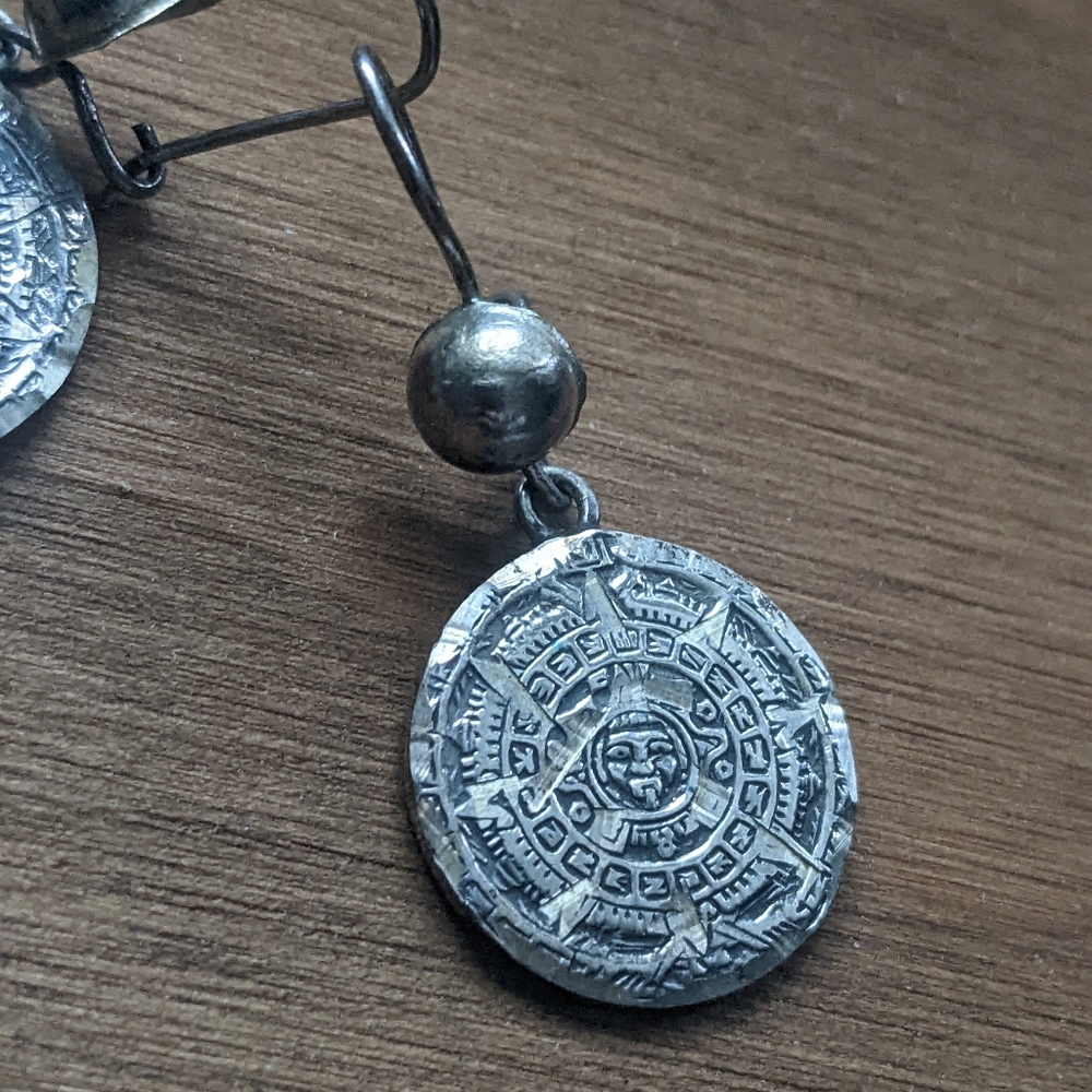 Sterling silver sundial earrings